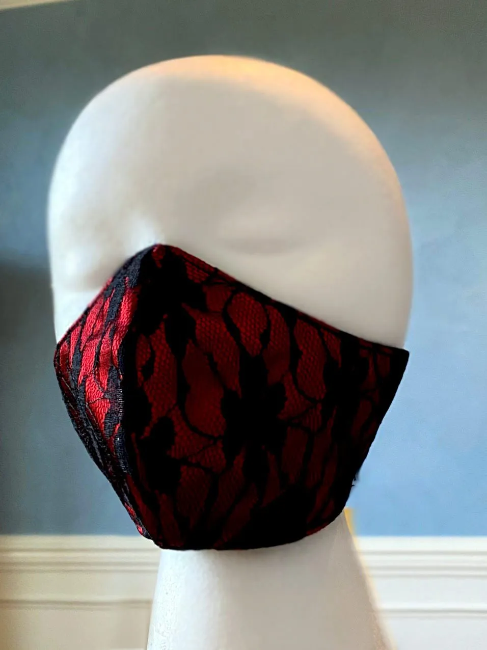 Fashion face cover/cloths face mask, red with black laces outside, cotton inside. Around head ribbon